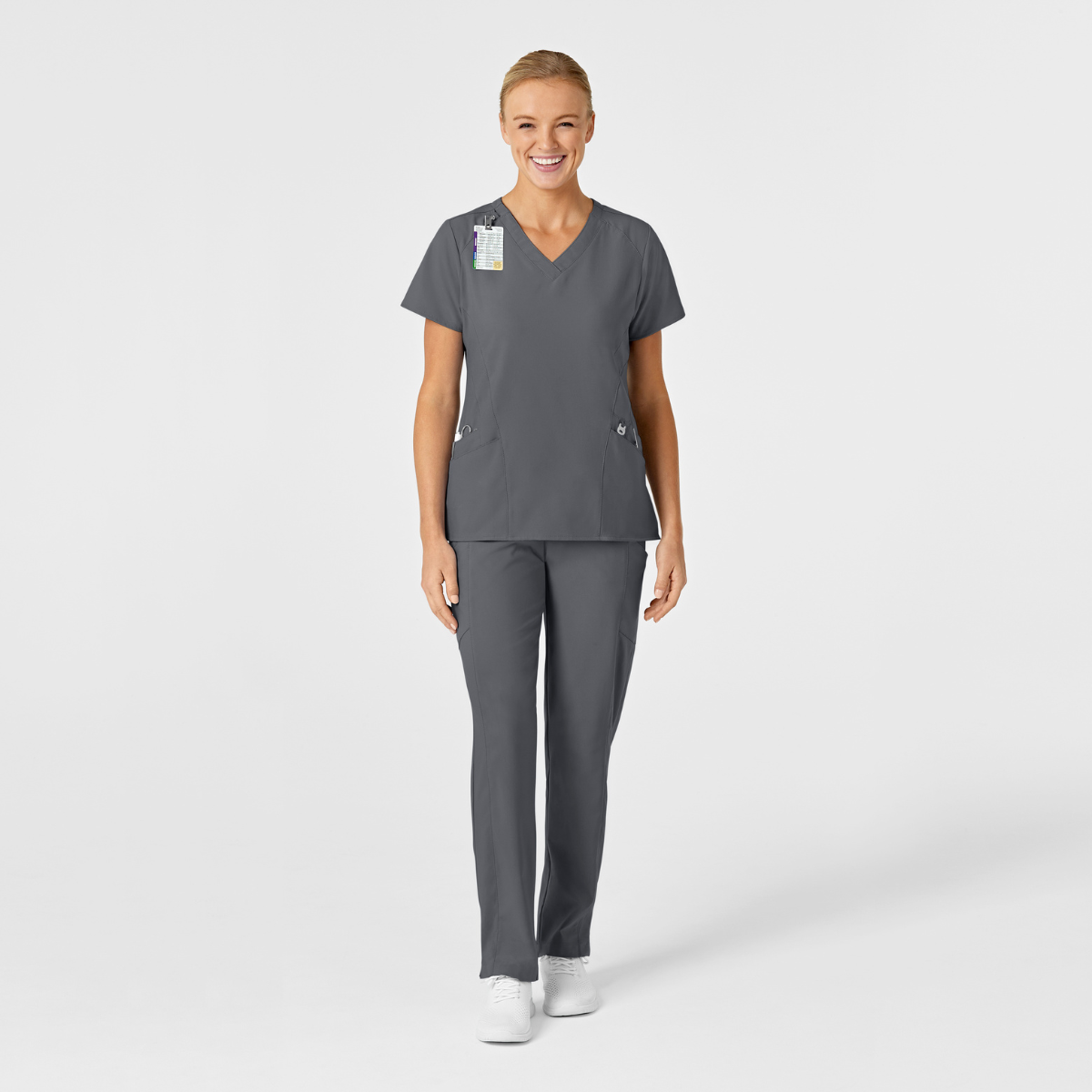 Scrub Médico Repelente a Líquidos de filipina estilizada con cuello V y pantalón doble cargo frontal liso para mujer | Marca Wink