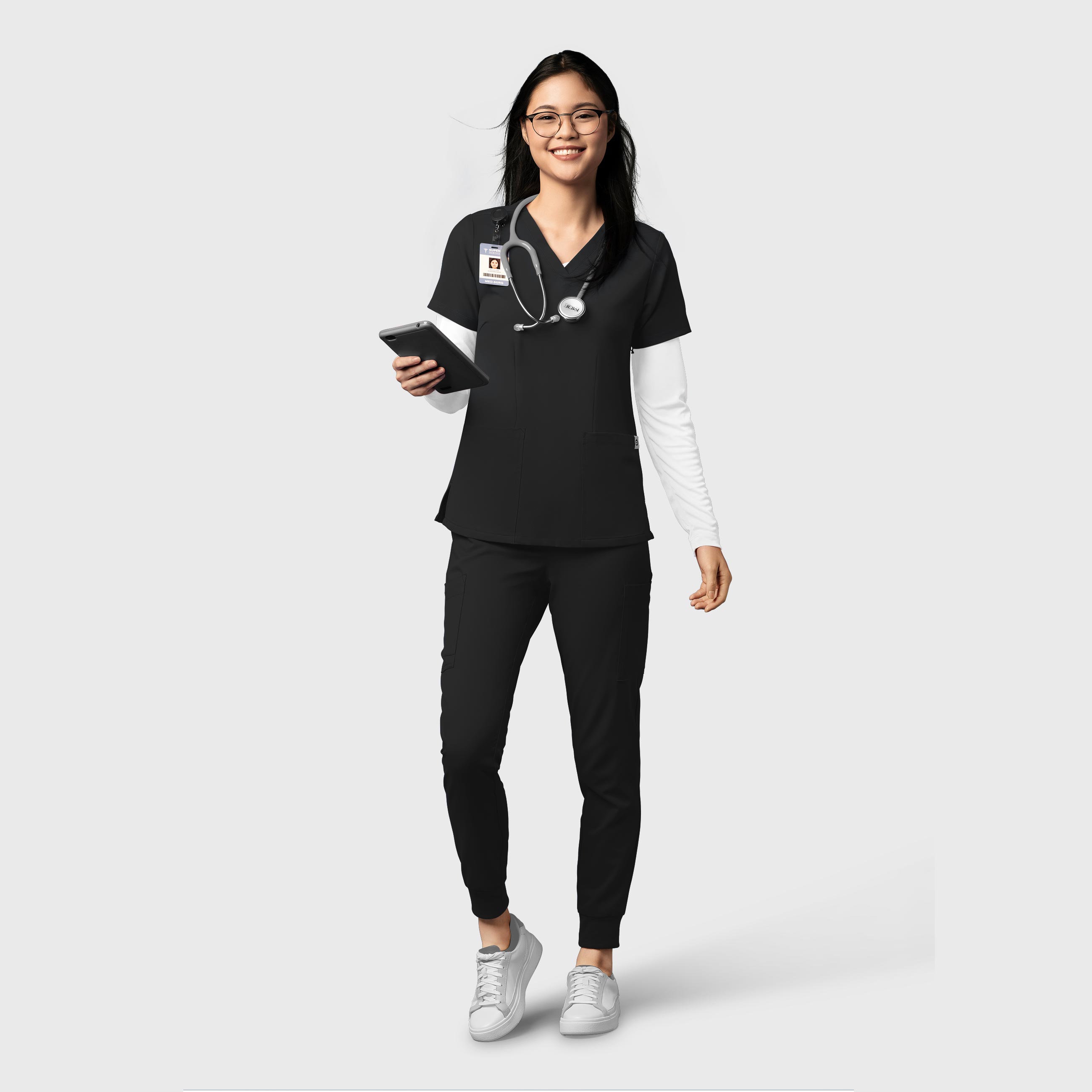 Scrub Uniforme Médico con Filipina con cuello en V curvo y pantalón jogger tipo cargo para mujer | Marca Wink