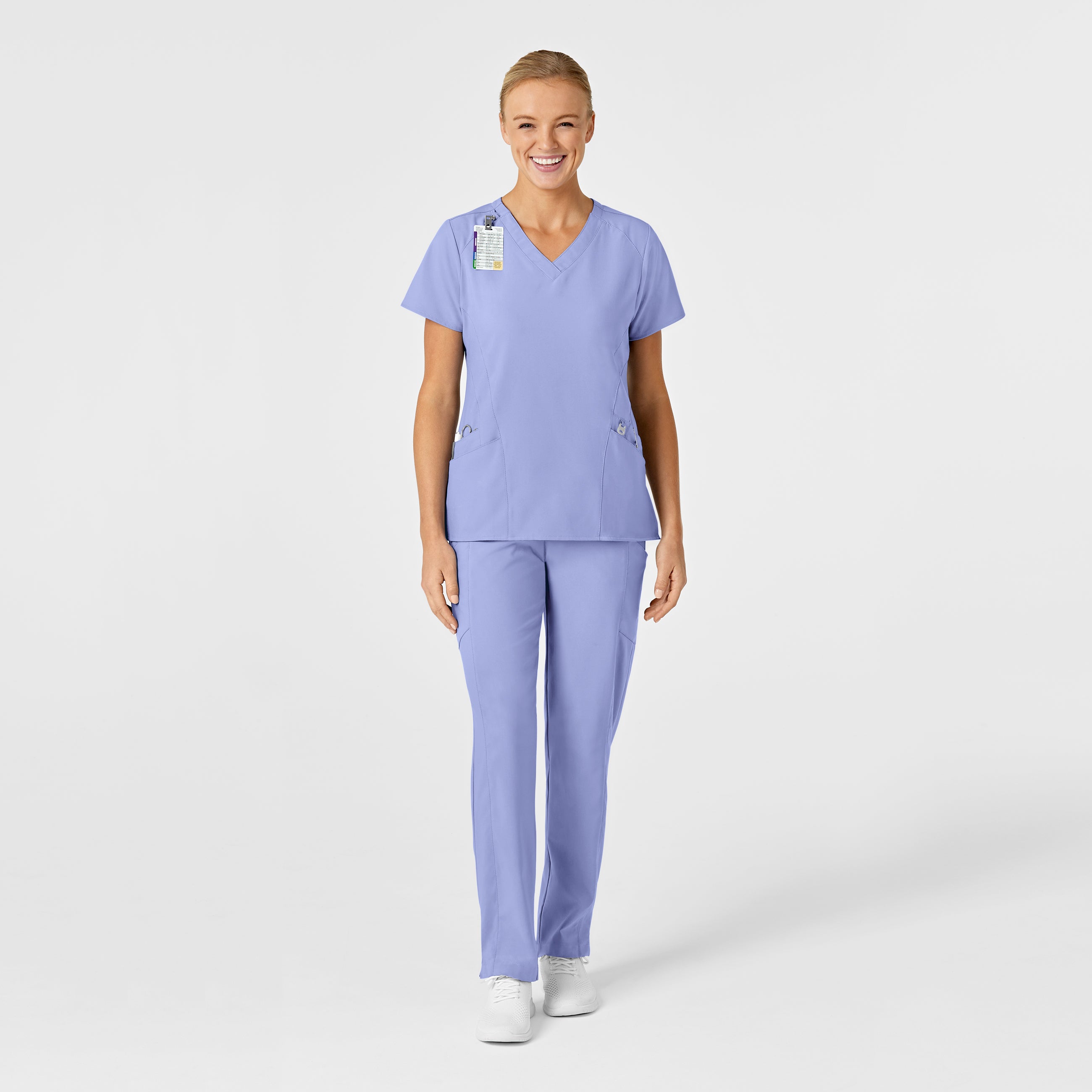 Scrub Médico Repelente a Líquidos de  filipina Estilizada con cuello V y pantalón doble cargo frontal liso para mujer | Marca Wink